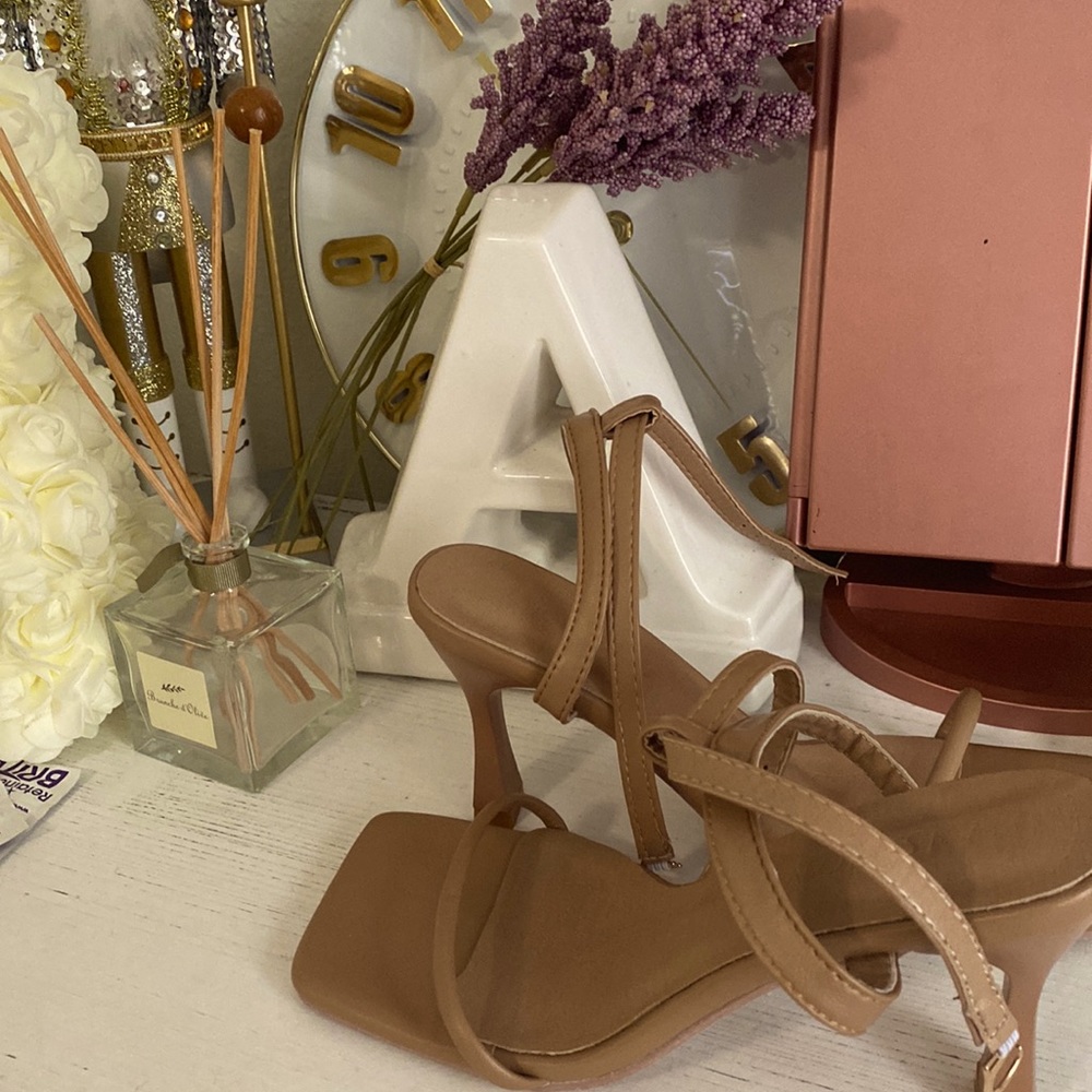 These are brand new never worn brown heels.